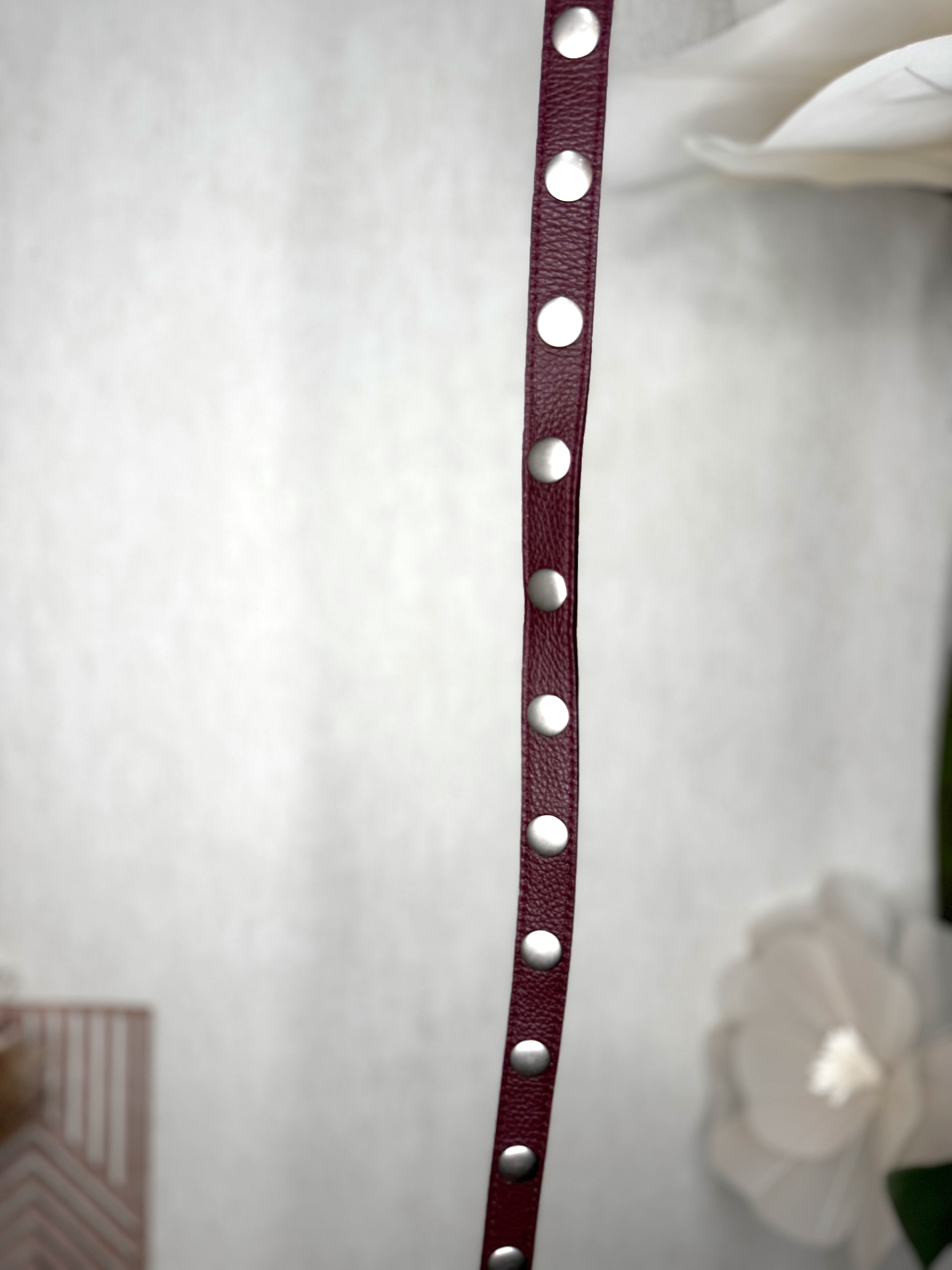 Cinturón tachuelas lazo