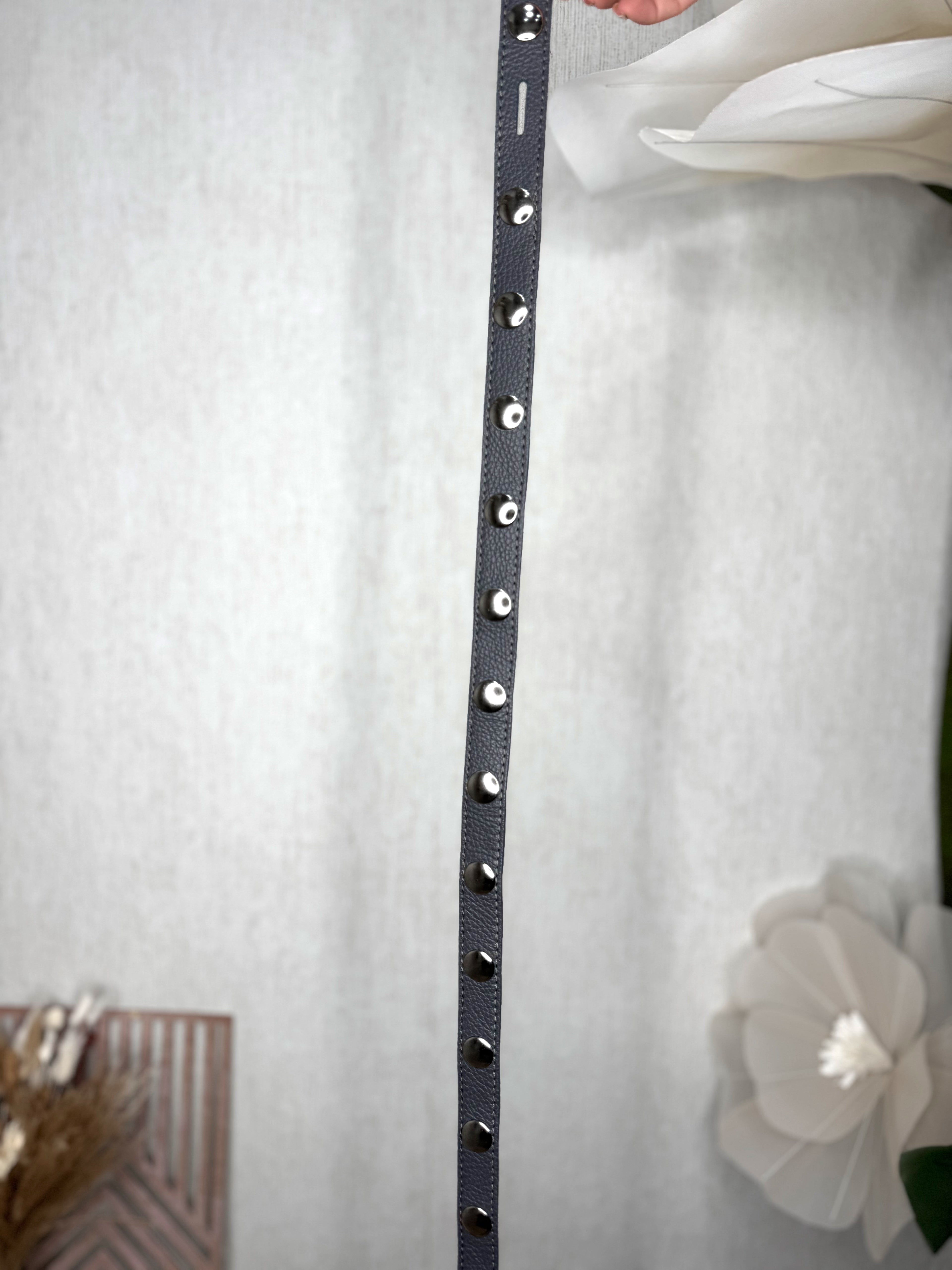 Cinturón tachuelas lazo