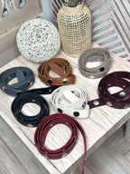 Cinturón tachuelas lazo